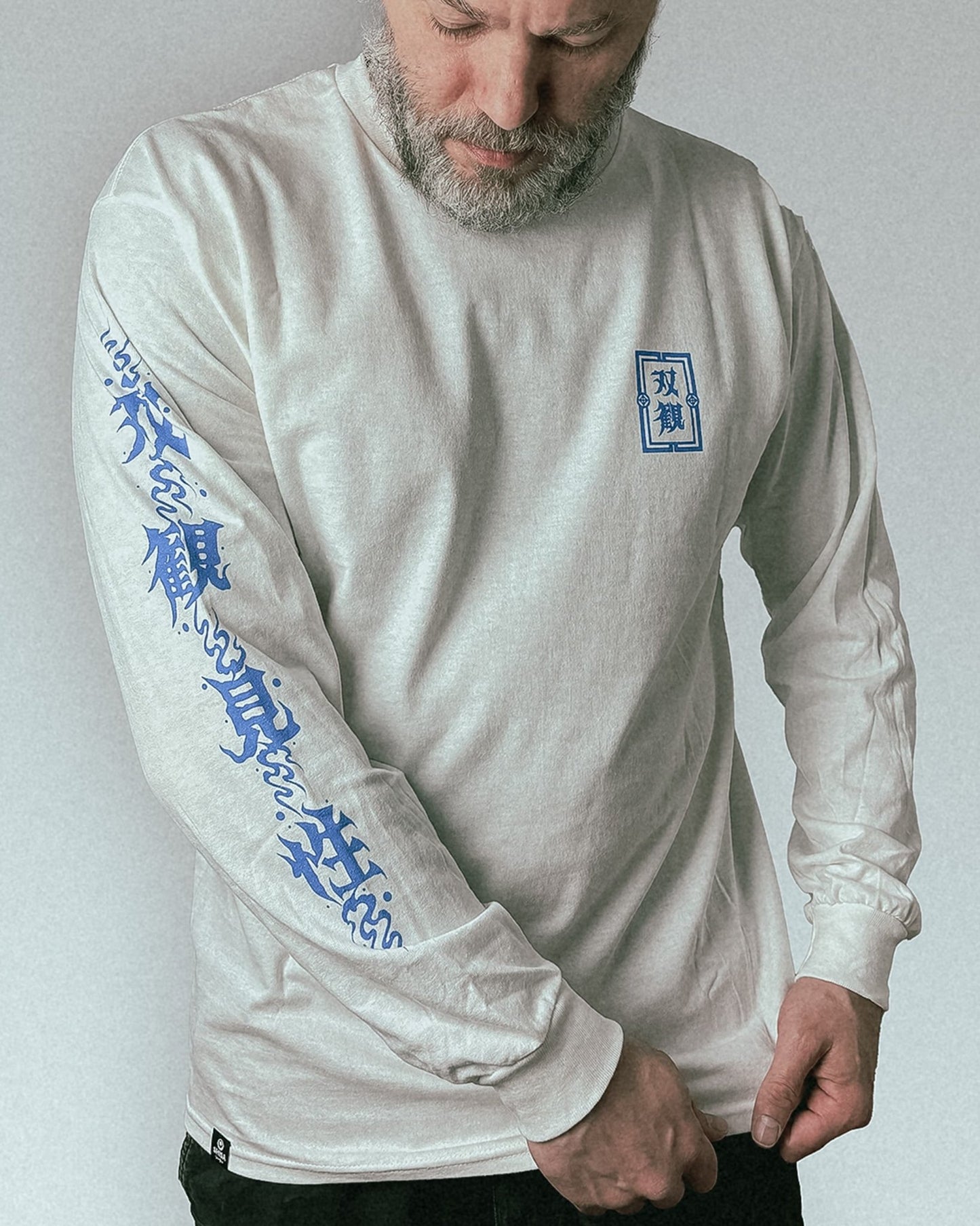 unisex white longsleeve with blue japanese martial arts design