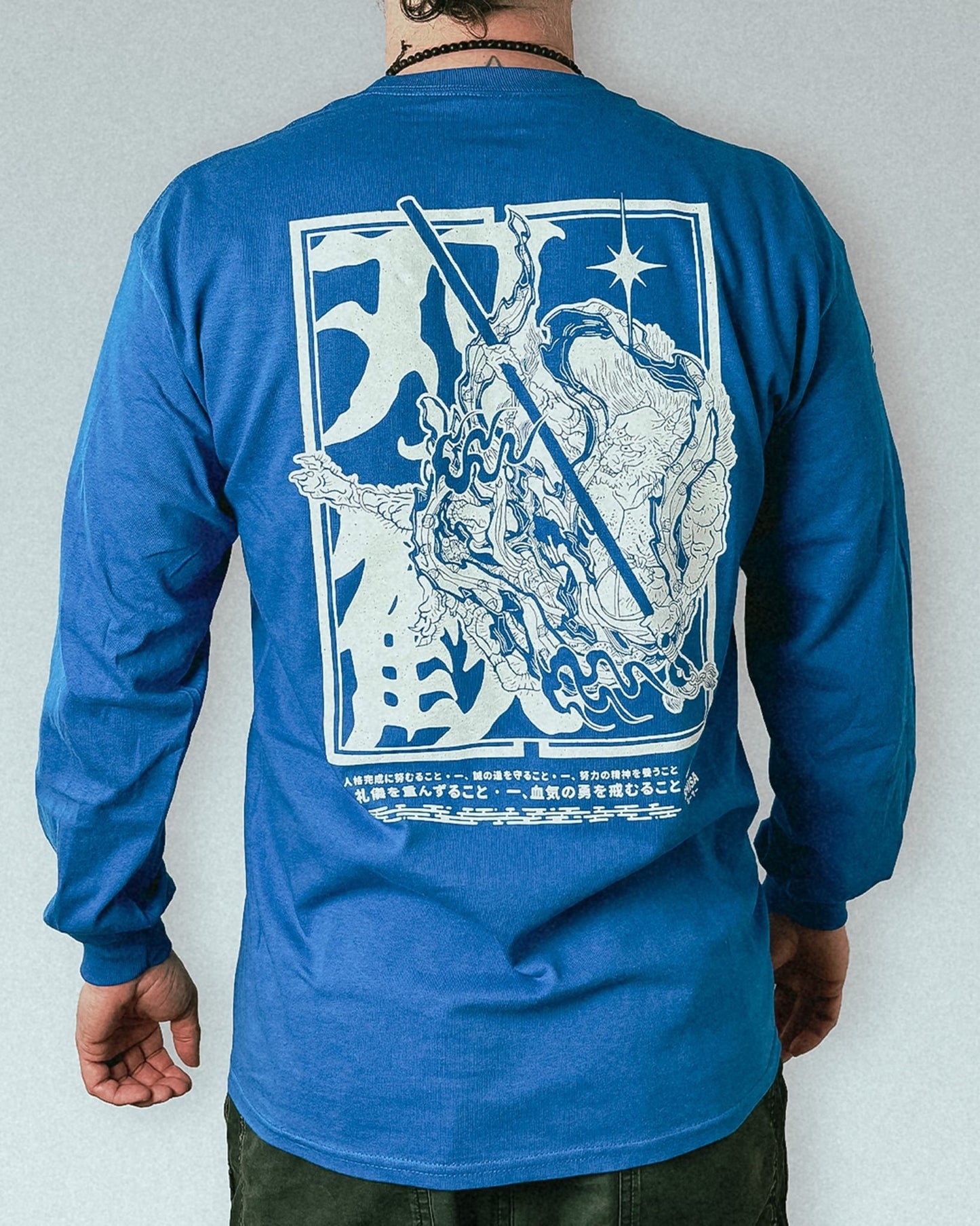 unisex blue longsleeve with white japanese martial arts design